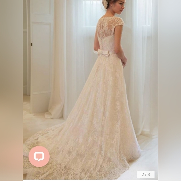 Elegant White Lace Wedding Dress - Picture 2 of 3